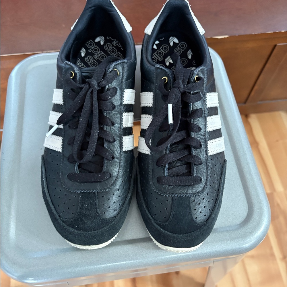 Adidas women Black Sneakers with White Stripes
